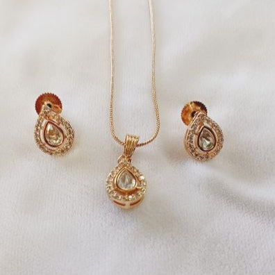 Gold Kundan Aarini Pendant Set with American Diamond Lining