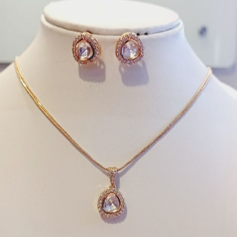 Kundan Pendant Set with a lining of American Diamond for Everyday Wear