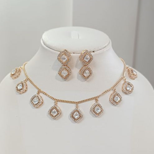 Gold Akshara Kundan Pendant Set with Carat Plating on Brass